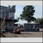 two more cuties sunbathing near the pier