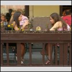 Young girls are relaxing in the opened bar